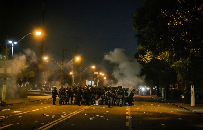 Police Squad during a protest in Brazil https://www.flickr.com/photos/midianinja/9123345702/